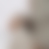 Galerie Bild 12 von 20 Junge Frau in Berlin mit dem REAL BLUE NC 3 in Pearl White auf dem Kopf schaut nach oben und hört Musik